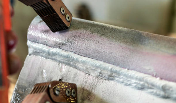 View of the longitudinal crack in the heat affected zone (top welding edge) with magnetic particle testing.